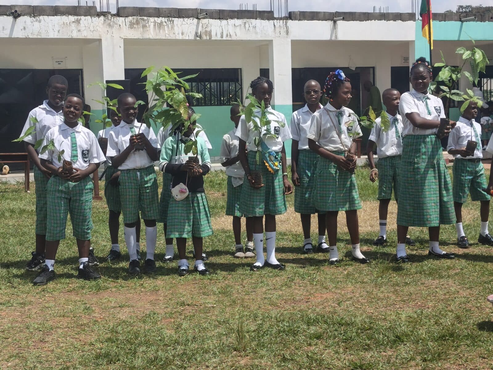 Pupils with their tree seedlings